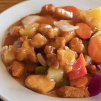 Sweet And Sour Chicken · Battered chicken covered with sweet and sour sauce, pineapple, carrots, bell pepper, and whi...