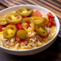 Fajita Mac · Mac and cheese topped with shredded chicken, grilled onion, grilled bell pepper and jalapeno.