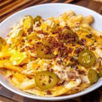 Jalapeno Bacon Chicken Fries · Fries topped with shredded chicken, bacon, jalapenos and cheese.