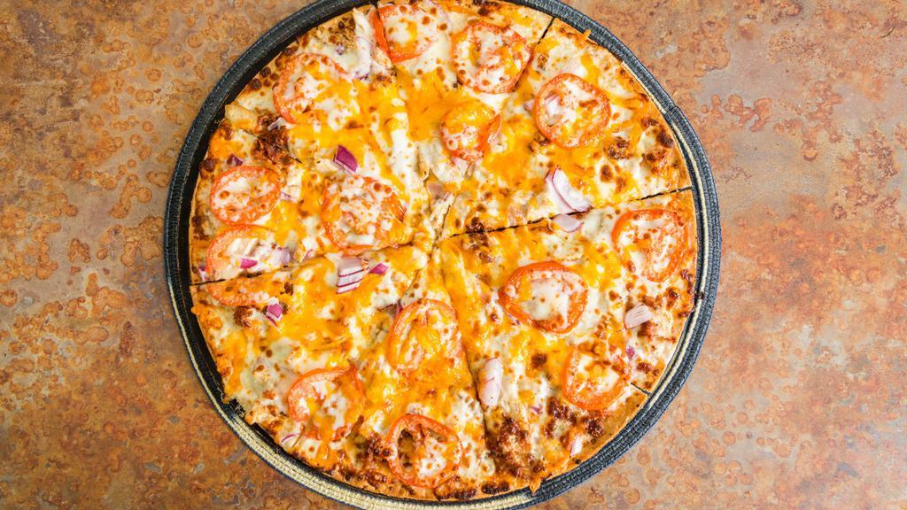 Chicken Bacon Ranch · Creamy ranch sauce, grilled chicken, bacon, red onions, tomatoes and cheddar cheese.