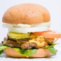 The Burger · Most popular. 2 Angus patties, lettuce, tomato, onions, pickles, with burger sauce. Served w...