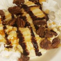 Ice Cream Sundae · French vanilla ice cream with chocolate, caramel & candied pecans