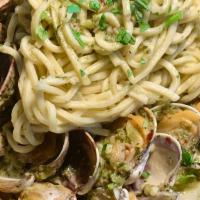 Pasta Con Vongole · Fresh manila clams sauteed with garlic parsley, white wine served with spaghetti.