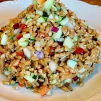 Farro Salad · A classic Tuscan salad made with organic ancient grain farro tossed with cucumbers, peppers,...