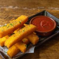 Polenta Fries · Sometimes called Canary fries in Tuscany, these crunchy fries are triple-cooked and served w...