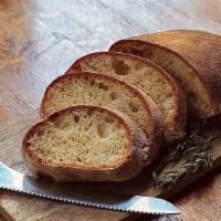 Loaf Of Tuscan Bread (Vg) · 1 lb. loaf of house-made Tuscan bread, baked fresh daily in our wood-fired oven. Vegan.