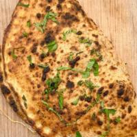 Calzone · The folded Pizza of Italy, Calzone literally means big sock! Italian ham, marinated artichok...