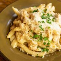 Pasta Pollo · Chicken breast sautéed with fresh penne pasta in a sage butter sauce with white wine, garlic...