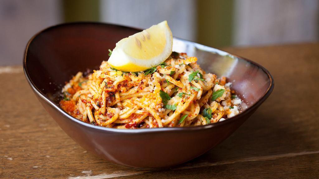 Spicy Spaghetti · Fresh egg spaghetti, chili flakes, garlic, extra virgin olive oil and Grana Padano. Vegetarian.
