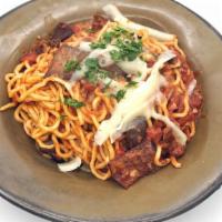 Spaghetti A Picchio Pachio · A traditional Sicilian eggplant pasta with fresh egg spaghetti, tomato sauce, chili pepper, ...