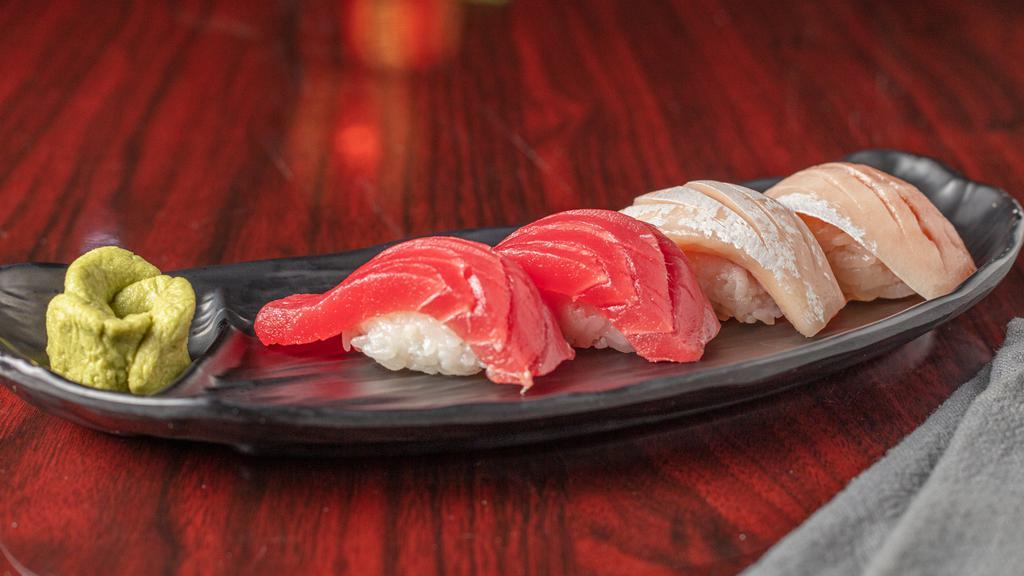 Tuna (2 Pc) · Consuming raw or undercooked meats, poultry, shellfish or eggs may increase your risk of foodborne illness.