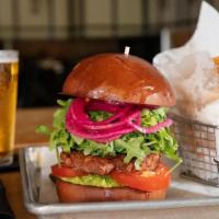 Veggie Burger · beyond burger, smashed avocado, arugula, pickled onions, heirloom tomatoes, brioche bun serv...