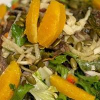 Citrus Salad · Field greens, Orange Supremes,  Red Onion, Hearts of palm, tossed in a chimichurri vinaigret...