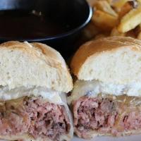 French Dip · Roast beef & Swiss cheese served on a French roll with au jus.