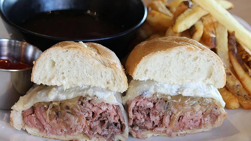 French Dip · Roast beef & Swiss cheese served on a French roll with au jus.