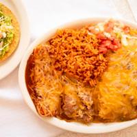Fiesta Combo · Smothered bean burrito, chili relleno & a beef taco. Served with refried beans a Spanish rice.
