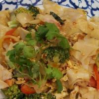 #64 Pad-Kee-Mow · Drunken noodle. Stir-fried wide rice noodle with Thai chili sauce, egg, garlic, tomato, yell...