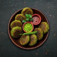 Pan-Fried Vegetarian Kabab · Pan-fried spiced patties made with a mix of spinach, green peas and potatoes.