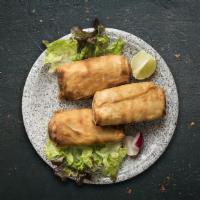 Vegetarian Spring Turnovers · A crispy snack made with mixed vegetable stuffing wrapped in thin translucent roll sheets.