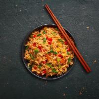 Vegetable Fried Rice · Long grain aromatic rice wok tossed  with vegetables and Indo-Chinese sauces