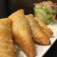 Chicken Curry Puffs (4) · Puff pastry, stuffed with chopped chicken, potato, onions, carrots and curry powder. Served ...