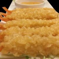Shrimp Tempura (6) · Deep fried crispy tempura shrimps to golden brown and served with plum sauce.