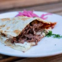 Carne Asada Quesadilla · Grilled carne asada, melted queso asadero, salsa, pico de gallo, guacamole