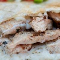 Pollo Asado Quesadilla · Grilled chicken, melted queso asadero, peppers, onions, salsa, pico de gallo, guacamole
