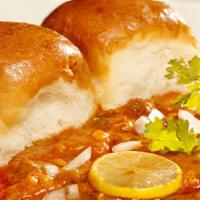 Pav Bhaji · Pav Bhaji is a spicy mashed vegetable dish, served piping hot with a dollop of butter, diced...