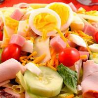 Chef Salad · Lettuce, turkey, ham, provolone cheese, cucumbers, boiled eggs.