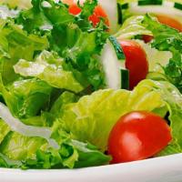 House Salad · Lettuce, tomato, cucumber, red onion, shredded carrots. Served with house dressing