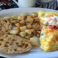 Omni Omelet · Ham, sausage and bacon along with bell pepper, onions, mushrooms and combo cheese. Top with ...