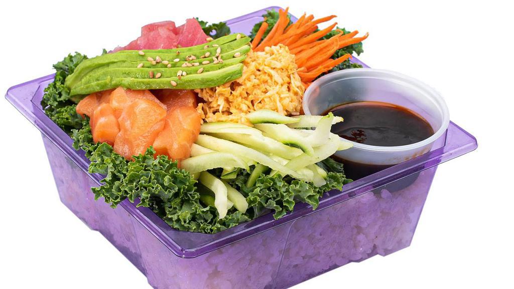 Poke Rice Bowl · Lettuce, carrot, cucumber, imitation crab salad, tuna or salmon, avocado with poke sauce.