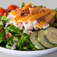 Sacks Cobb Salad · Turkey, bacon, and cheddar cheese atop sacks garden salad with broccoli, cauliflower, and to...