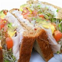 Sacks Symphony Sandwich · Turkey breast, bacon, avocado, tomato, alfalfa sprouts, cream cheese, and mayonnaise on 12-g...