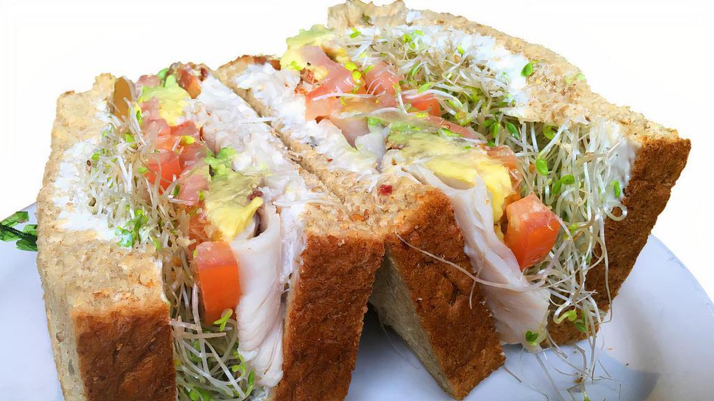 Sacks Symphony Sandwich · Turkey breast, bacon, avocado, tomato, alfalfa sprouts, cream cheese, and mayonnaise on 12-grain bread.