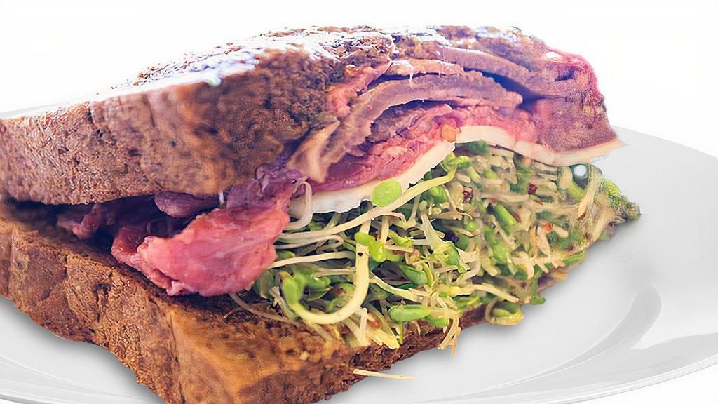 Sacks Van Gogh Sandwich · Rare roast beef, fresh dill, Havarti cheese, sprouts, and sacks special deli mustard, on pumpernickel bread.