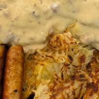Hillsbery Scramble · 2 big hot delish biscuits topped with scrambled eggs smothered in Tempe's best sausage gravy...