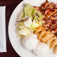 Chicken Teriyaki · Served with rice, salad and sauce. Marinated chicken thigh meat, grilled.