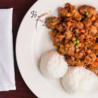 General Tsao'S Chicken · Fried chicken sauteed in a sweet and spicy sauce with peas and carrots.