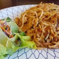 Chicken Pad Thai · Served spicy. Served with steamed rice. Stir-fried rice noodles with chicken, egg, ground pe...