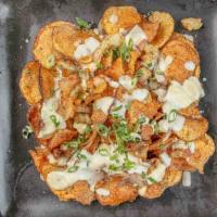 Gorgonzola Chips  · house potato chips, gorgonzola cream sauce, crisp Colorado pork belly pieces, balsamic reduc...