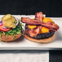 The All American Burger · Applewood smoked bacon, cheddar, tomato, red onion, lettuce and pickles.