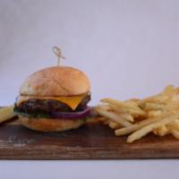 Classic Cheeseburger · Cheddar, tomato, red onion, lettuce and pickles.