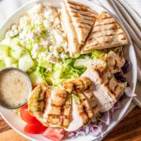 Santorini Greek Salad With Chicken · Grilled chicken breast, romaine, feta crumbles, red onions, tomatoes, cucumbers, and kalamat...