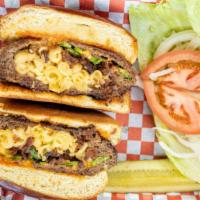 Mac N Cheese Burger · Stuffed with creamy mac n' cheese, sliced jalapenos, and bacon.