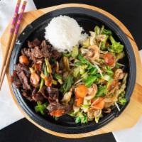 Beef Bulgogi Plate · Korean Bulgogi with rice and stir fried veggies on the side.