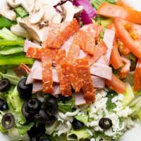 Chef Salad · Fresh romaine lettuce with julienne ham, pepperoni, fresh green peppers, red onions, black o...