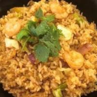 Thai Pineapple Fried Rice · Thai-style cooked to order with your choice of meat. Includes egg, red onion, with flavorful...