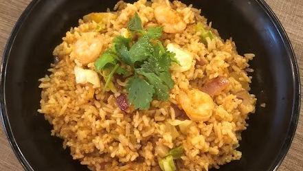 Thai Pineapple Fried Rice · Thai-style cooked to order with your choice of meat. Includes egg, red onion, with flavorful red curry sauce!